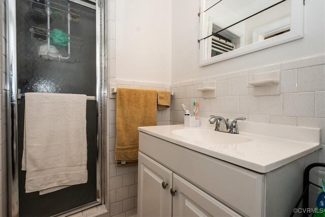 5120 Monza Ct, North Chesterfield, VA 23234 - bathroom with tile walls, vanity, a shower with door, and a wainscoted wall