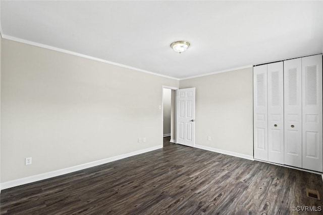 4706 Leadenhall Dr, Chesterfield, VA 23234 - unfurnished bedroom with dark wood-type flooring, crown molding, baseboards, and a closet