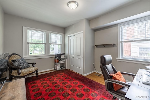 1815 Seddon Rd, Richmond, VA 23227 - home office with wood finished floors and plenty of natural light