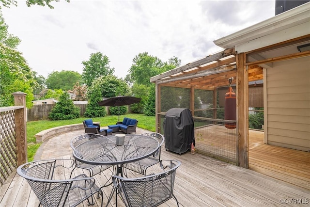 1815 Seddon Rd, Richmond, VA 23227 - wooden deck featuring area for grilling, outdoor dining space, a fenced backyard, and an outdoor living space