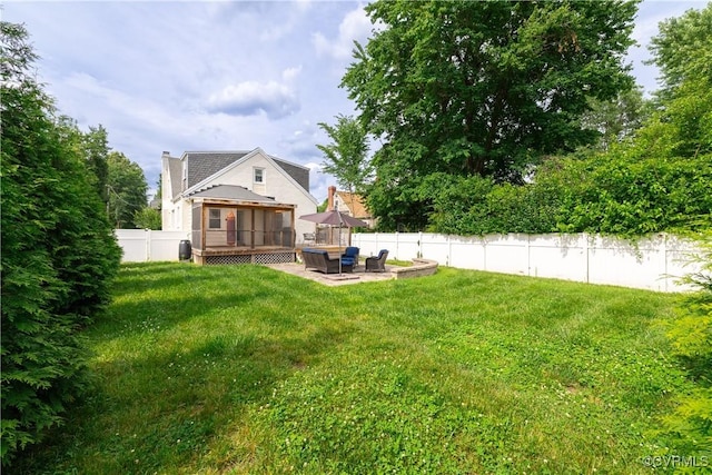 1815 Seddon Rd, Richmond, VA 23227 - back of house with a sunroom, a chimney, an outdoor living space, a fenced backyard, and a patio area