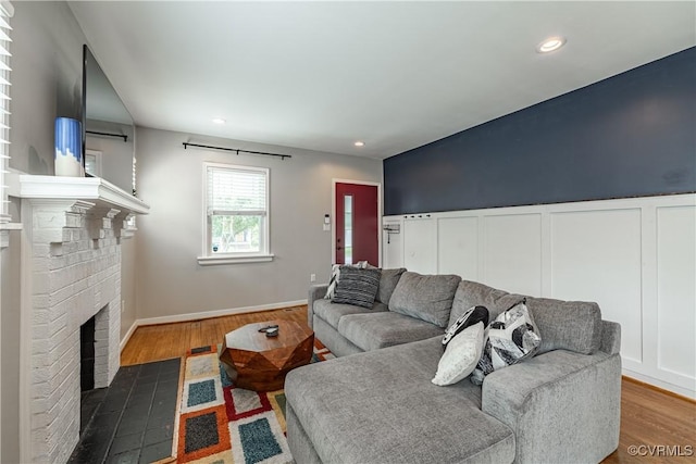 1815 Seddon Rd, Richmond, VA 23227 - living area with wood finished floors, a fireplace, and recessed lighting