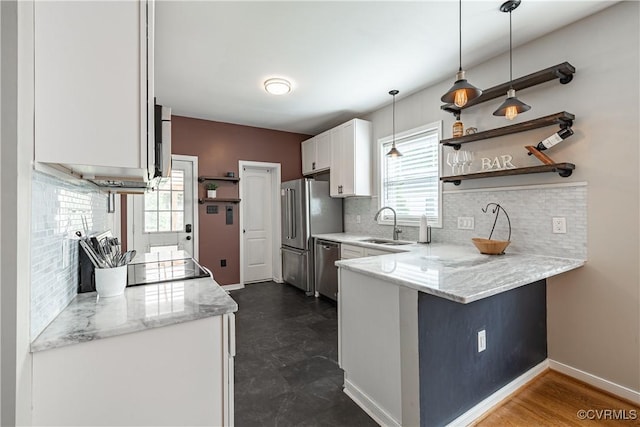 1815 Seddon Rd, Richmond, VA 23227 - kitchen with a peninsula, stainless steel appliances, open shelves, and white cabinets