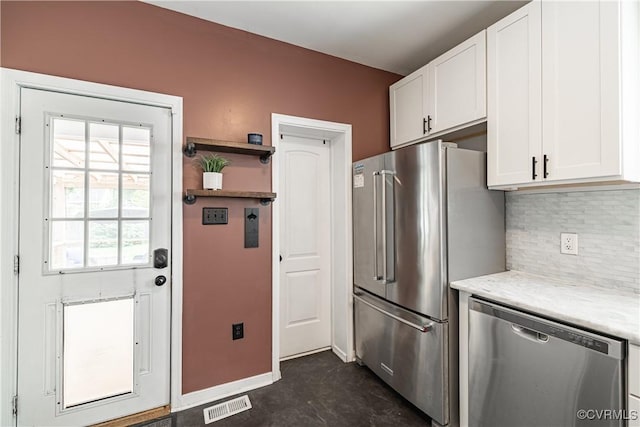 1815 Seddon Rd, Richmond, VA 23227 - kitchen with stainless steel appliances, white cabinets, backsplash, light countertops, and open shelves
