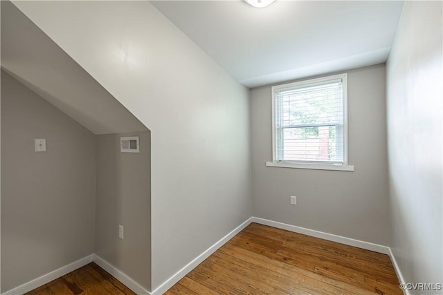 1815 Seddon Rd, Richmond, VA 23227 - additional living space with wood finished floors and lofted ceiling