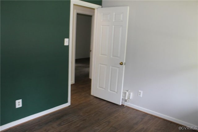 5041 Oakforest Dr, Chesterfield, VA 23832 - spare room with baseboards and dark wood-type flooring