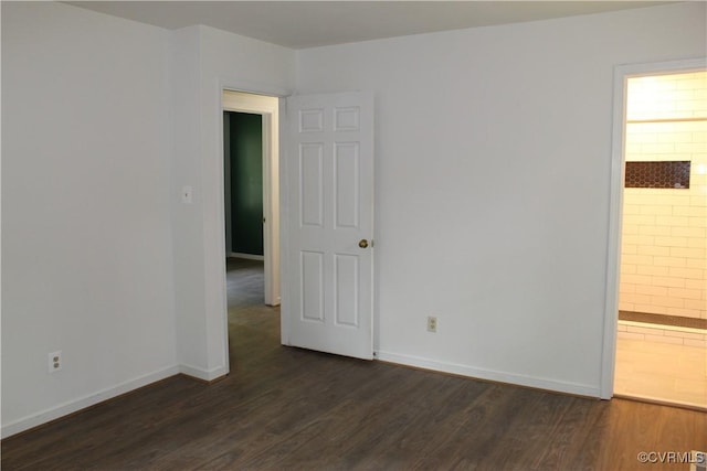5041 Oakforest Dr, Chesterfield, VA 23832 - spare room with dark wood-type flooring and baseboards