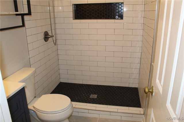 5041 Oakforest Dr, Chesterfield, VA 23832 - bathroom featuring vanity, tiled shower, and toilet