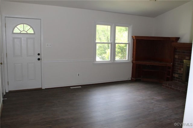 5041 Oakforest Dr, Chesterfield, VA 23832 - foyer featuring dark wood-style flooring, a brick fireplace, and baseboards