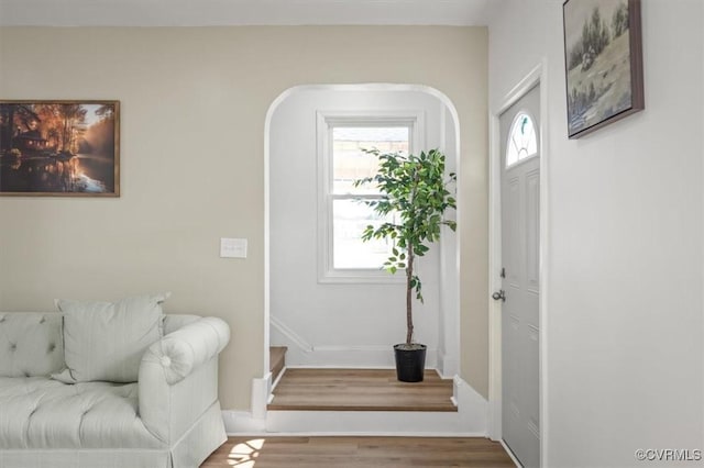 215 S S St, Petersburg, VA 23803 - entryway featuring wood finished floors, arched walkways, and baseboards