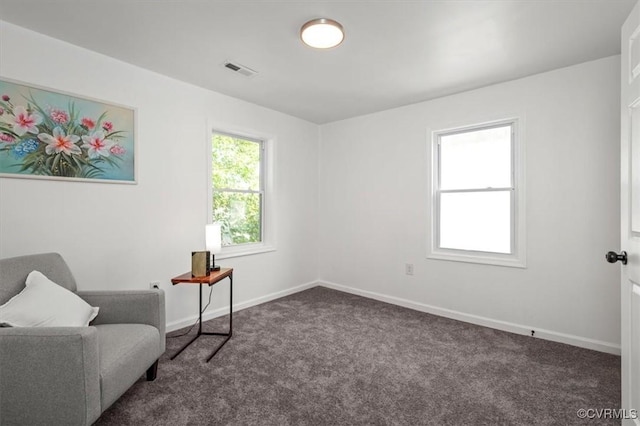 215 S S St, Petersburg, VA 23803 - living area featuring carpet floors and baseboards