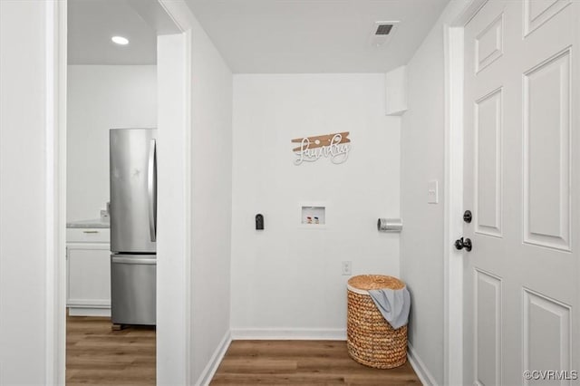 215 S S St, Petersburg, VA 23803 - laundry room with washer hookup, wood finished floors, baseboards, and recessed lighting