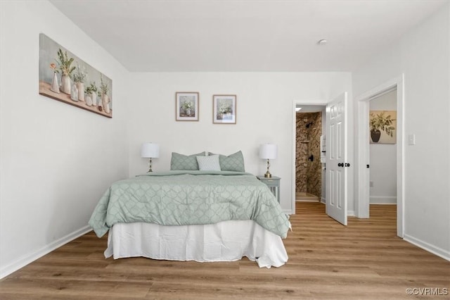 215 S S St, Petersburg, VA 23803 - bedroom with baseboards and wood finished floors
