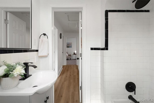 215 S S St, Petersburg, VA 23803 - full bathroom with vanity, wood finished floors, and bathtub / shower combination