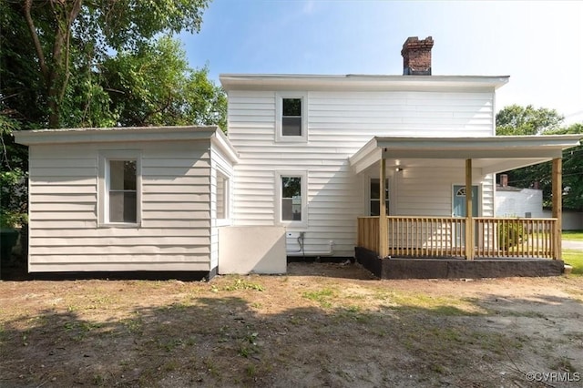 215 S S St, Petersburg, VA 23803 - back of house featuring a chimney