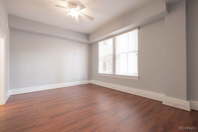 6 N 6th St Unit U3C, Richmond, VA 23219 - unfurnished room featuring ceiling fan, dark wood-type flooring, and baseboards
