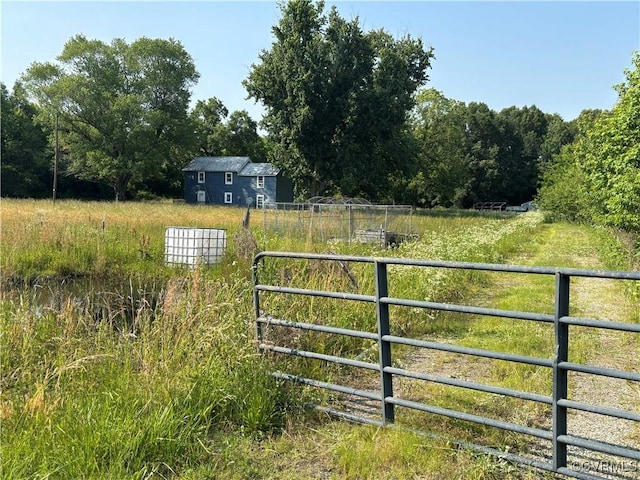 23315 King William Rd, West Point, VA 23181 - gate with a view of trees and a rural view