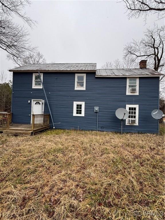 23315 King William Rd, West Point, VA 23181 - back of property featuring a chimney, a wooden deck, and a yard