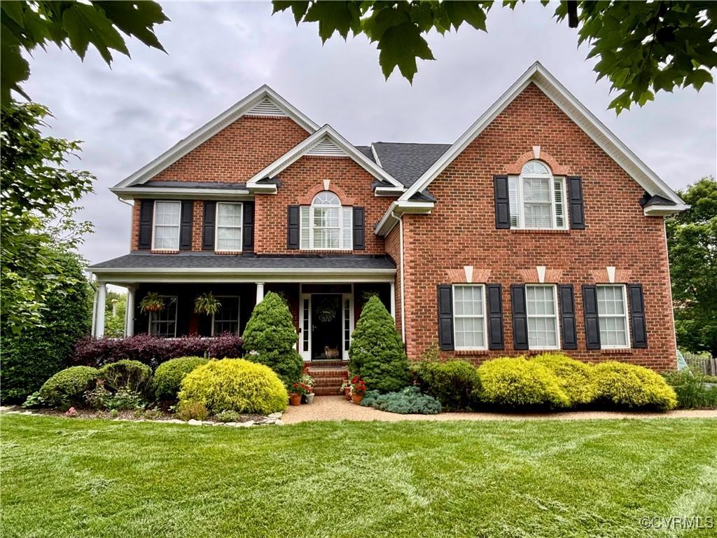5201 Rivers Edge Pl, Henrico, VA 23059 - view of front of property with a front lawn and brick siding