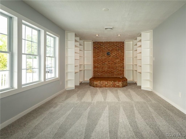 5810 Gunsight Ct, North Chesterfield, VA 23237 - unfurnished living room with carpet, baseboards, and a textured ceiling