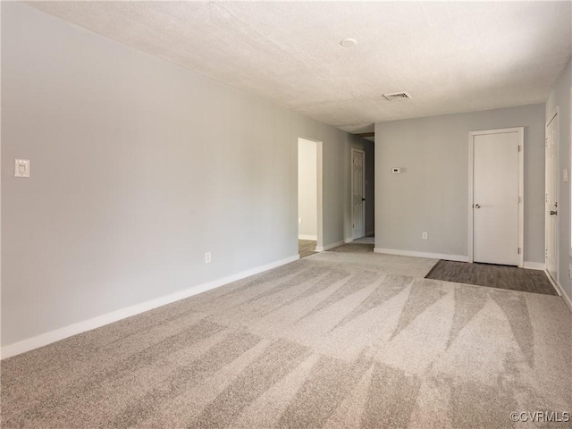 5810 Gunsight Ct, North Chesterfield, VA 23237 - carpeted empty room with baseboards and a textured ceiling