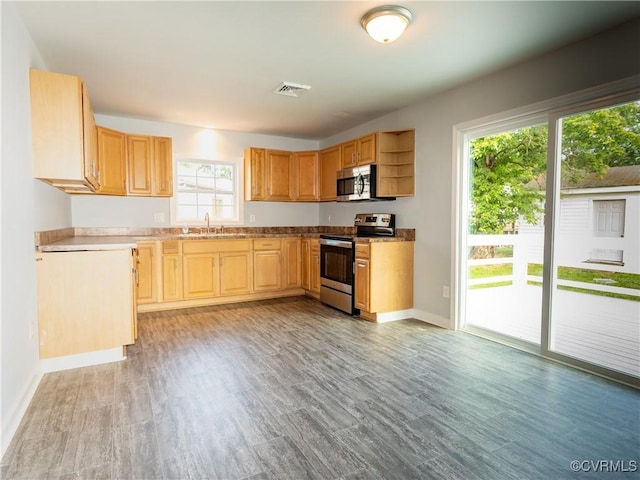 5810 Gunsight Ct, North Chesterfield, VA 23237 - kitchen with appliances with stainless steel finishes, a sink, light wood-type flooring, baseboards, and open shelves