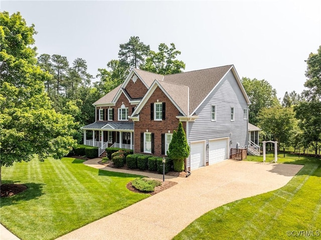 4307 Wilcot Dr, Midlothian, VA 23113 - view of front of house featuring a porch, an attached garage, driveway, a front lawn, and brick siding