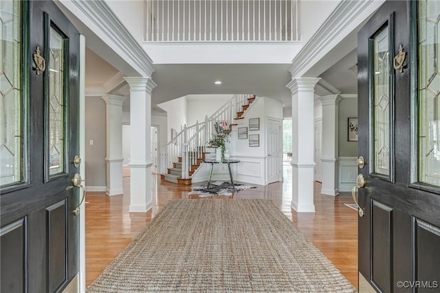 4307 Wilcot Dr, Midlothian, VA 23113 - foyer entrance with crown molding, stairway, light wood-type flooring, baseboards, and a decorative wall