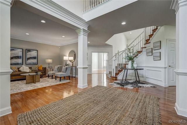 4307 Wilcot Dr, Midlothian, VA 23113 - foyer entrance with decorative columns, wood finished floors, stairway, crown molding, and baseboards