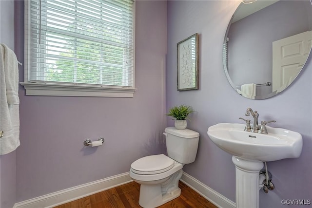 4307 Wilcot Dr, Midlothian, VA 23113 - bathroom with baseboards, toilet, and wood finished floors