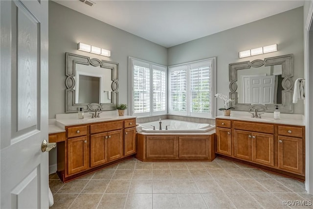 4307 Wilcot Dr, Midlothian, VA 23113 - bathroom with a bath, two vanities, and tile patterned flooring