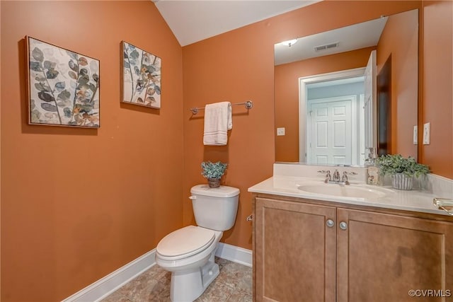 4307 Wilcot Dr, Midlothian, VA 23113 - half bathroom with toilet, vanity, baseboards, tile patterned floors, and vaulted ceiling