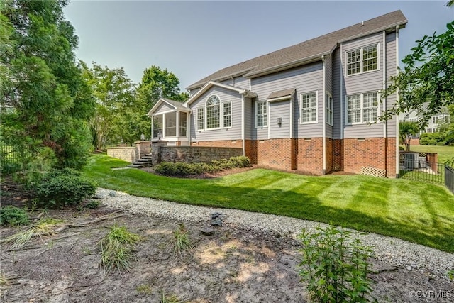4307 Wilcot Dr, Midlothian, VA 23113 - back of house featuring a sunroom and brick siding