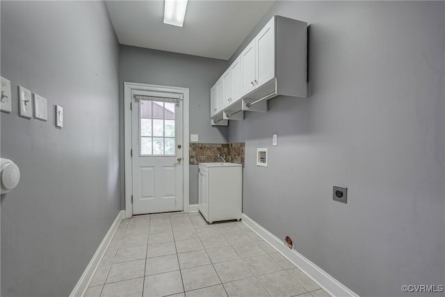 4307 Wilcot Dr, Midlothian, VA 23113 - laundry room featuring washer hookup, cabinet space, electric dryer hookup, light tile patterned floors, and baseboards