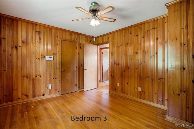4212 Randolph Rd, North Chesterfield, VA 23236 - unfurnished room featuring wood finished floors, ceiling fan, and wooden walls