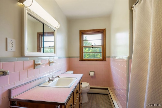4212 Randolph Rd, North Chesterfield, VA 23236 - bathroom featuring tile patterned floors, tile walls, vanity, a wainscoted wall, and a shower with curtain
