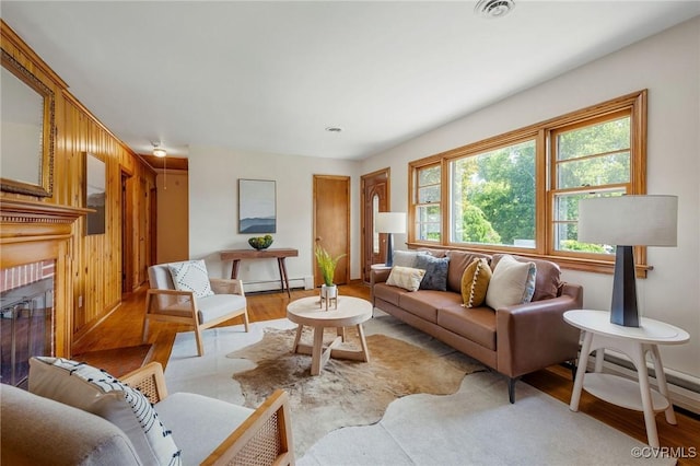 4212 Randolph Rd, North Chesterfield, VA 23236 - living area featuring light wood-style flooring and baseboard heating