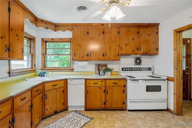 4212 Randolph Rd, North Chesterfield, VA 23236 - kitchen featuring white appliances, light countertops, a ceiling fan, and brown cabinets
