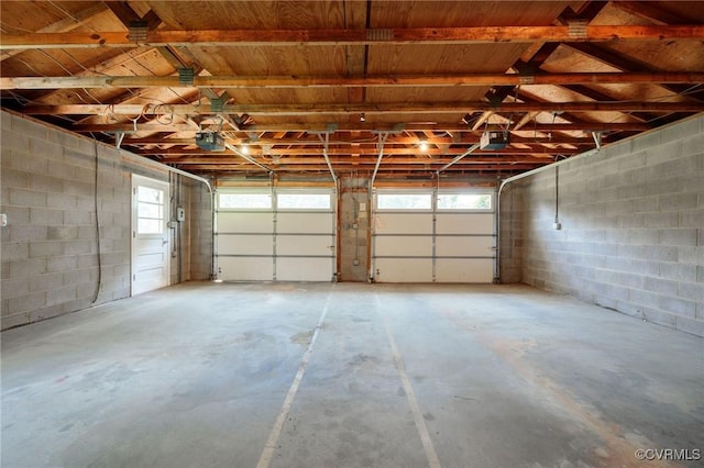 4212 Randolph Rd, North Chesterfield, VA 23236 - garage with concrete block wall and a garage door opener