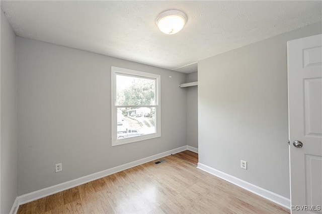 6406 Lothaire Ct, North Chesterfield, VA 23234 - empty room with light wood-style floors and baseboards