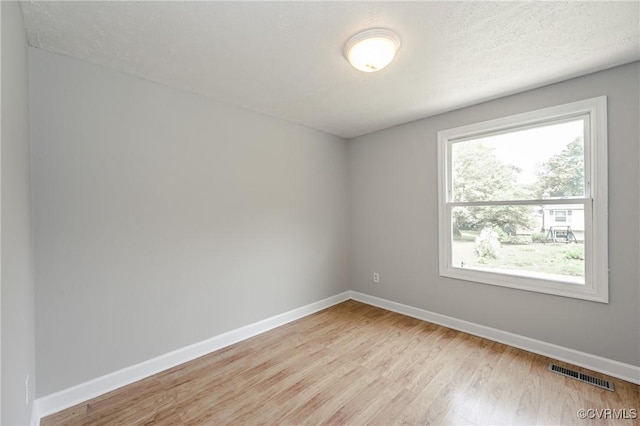 6406 Lothaire Ct, North Chesterfield, VA 23234 - empty room with baseboards and light wood-style flooring