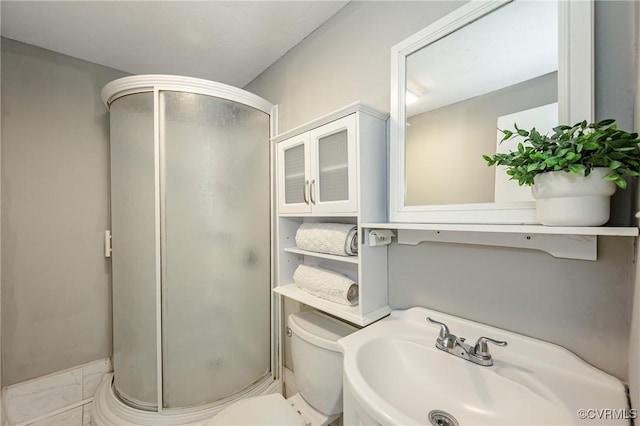 6406 Lothaire Ct, North Chesterfield, VA 23234 - bathroom featuring a shower stall, toilet, marble finish floors, and a sink