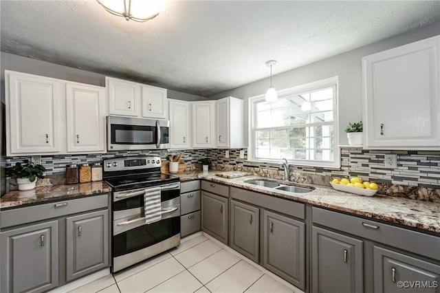 6406 Lothaire Ct, North Chesterfield, VA 23234 - kitchen with stainless steel appliances, gray cabinetry, and a sink