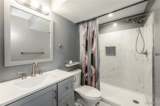 6406 Lothaire Ct, North Chesterfield, VA 23234 - bathroom featuring toilet, vanity, and a tile shower