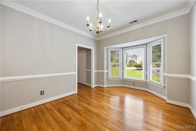 12410 Creek Mill Ct, Glen Allen, VA 23059 - spare room with a chandelier, light wood-type flooring, and crown molding