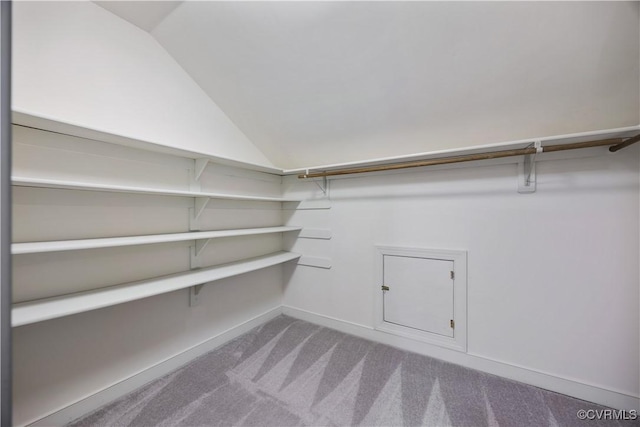12410 Creek Mill Ct, Glen Allen, VA 23059 - spacious closet featuring carpet and vaulted ceiling