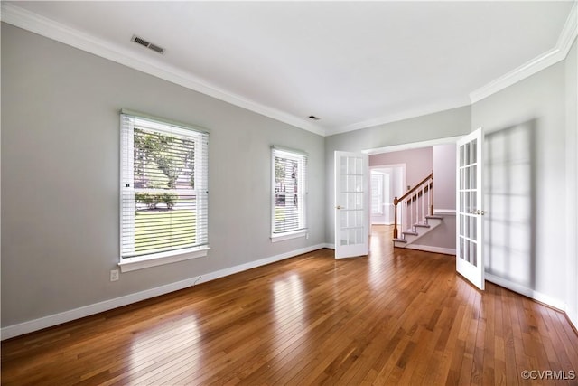 12410 Creek Mill Ct, Glen Allen, VA 23059 - spare room with french doors, hardwood / wood-style floors, ornamental molding, and stairway