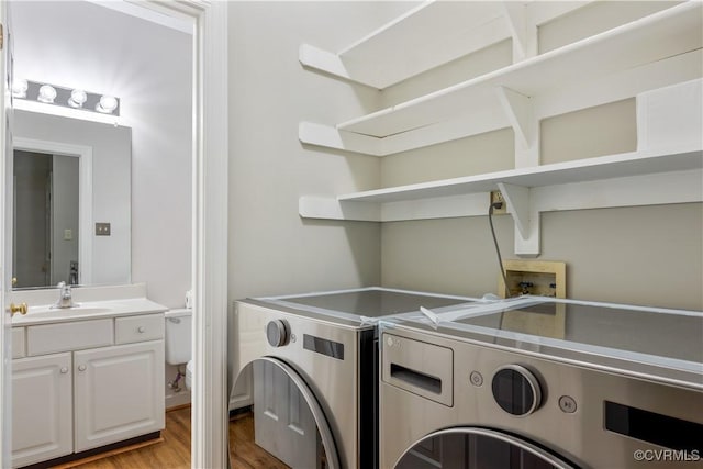 12410 Creek Mill Ct, Glen Allen, VA 23059 - laundry area with washing machine and dryer and light wood finished floors