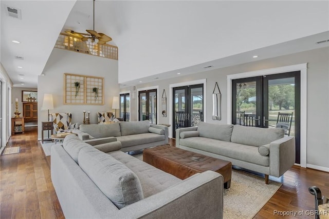 1083 Ottoman Ferry Rd, Mollusk, VA 22503 - living room featuring french doors, hardwood / wood-style floors, a ceiling fan, recessed lighting, and baseboards