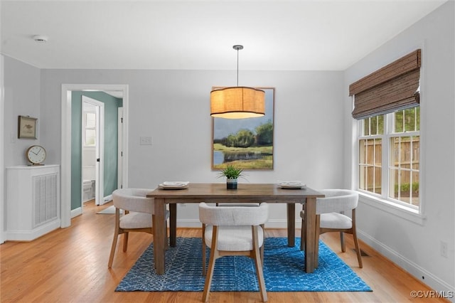 1004 Dinwiddie Ave, Henrico, VA 23229 - dining room featuring light wood-style flooring and baseboards